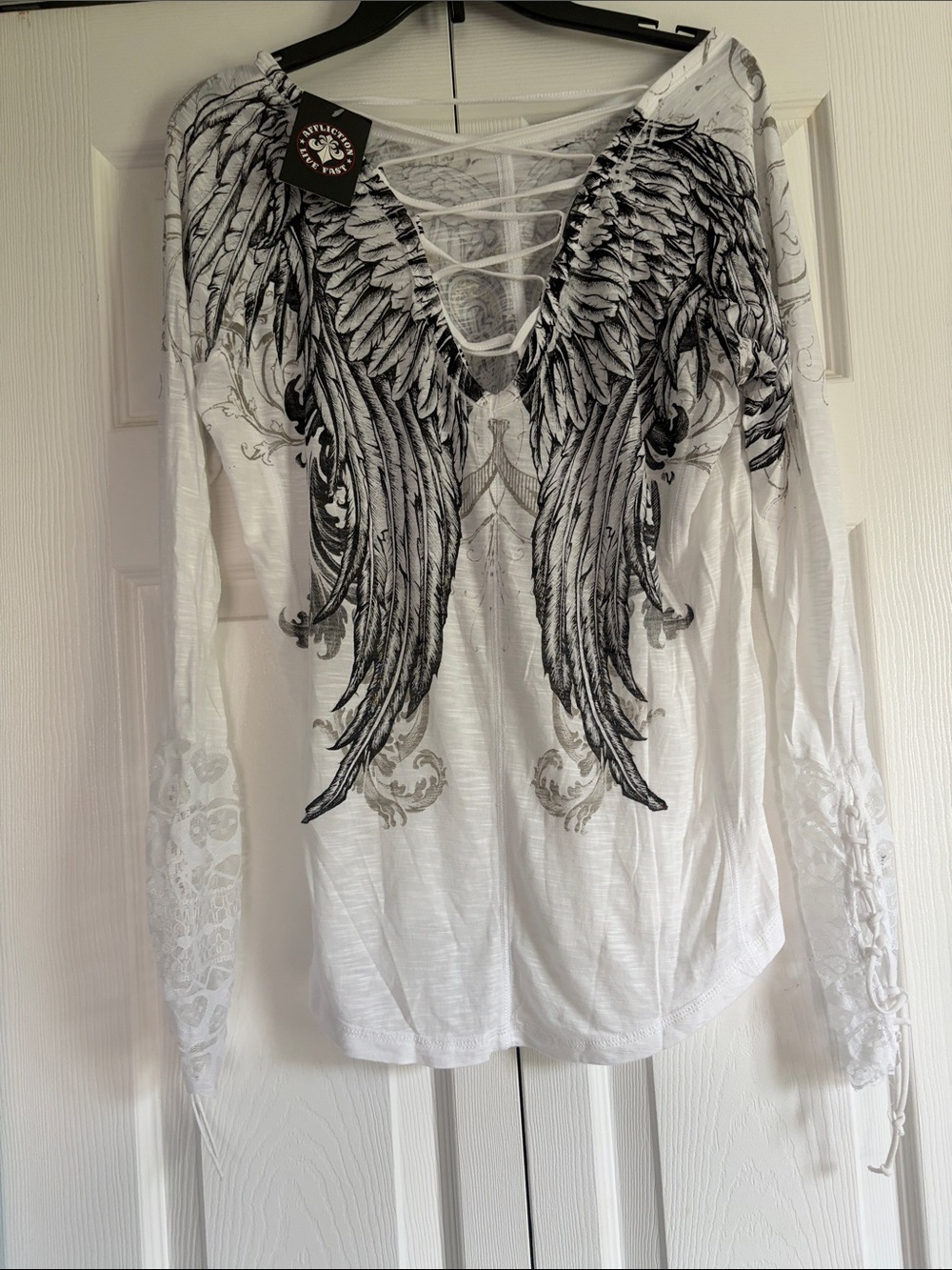 Affliction White Long-Sleeve Lace-Up Top with Black Wing Graphic $58 NEW